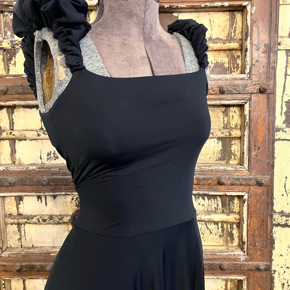 Maygel Coronel Elegant Black Dress with Ruffled Sleeves